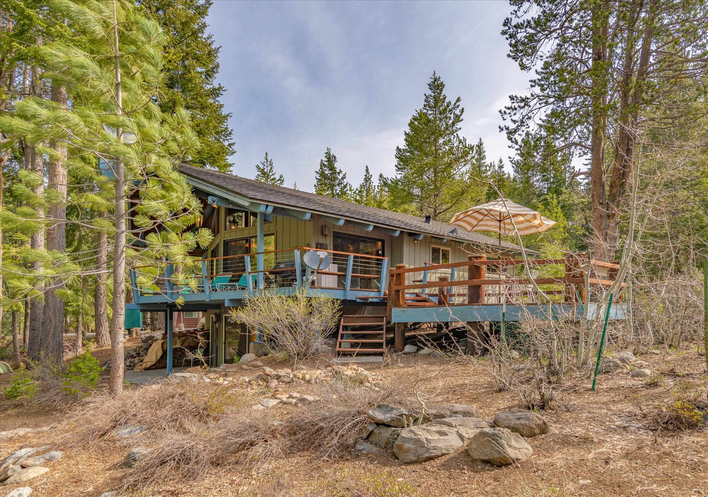 6860 River Road Truckee, CA 96161 - Photo 21 of 21 a view of a house with backyard and sitting area