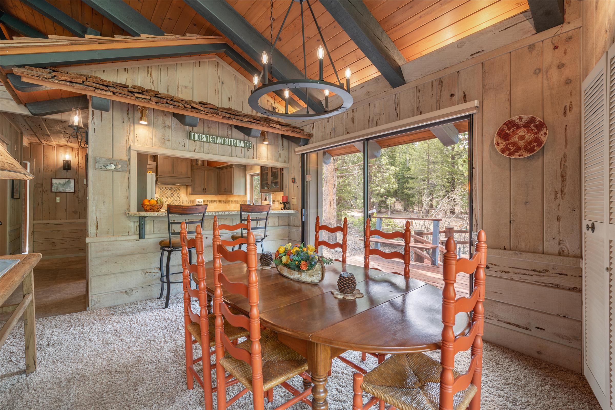 6860 River Road Truckee, CA 96161 - Photo 8 of 21 a view of a dining room with furniture window and outside view