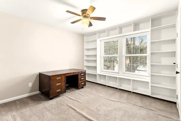 a room with furniture and window