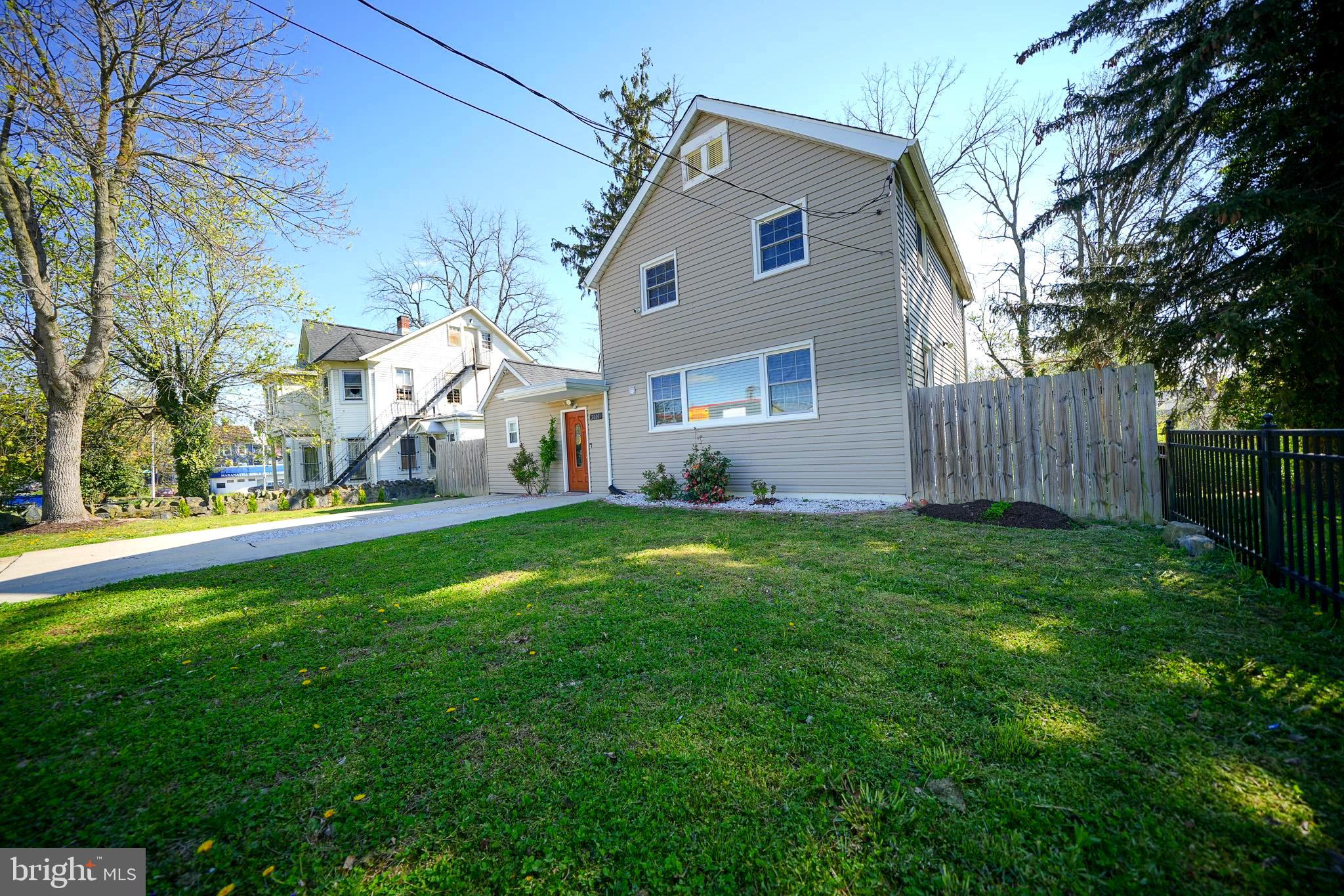 2001 Denison Street Baltimore, MD 21216 - Photo 3 of 42 a front view of house with yard and green space