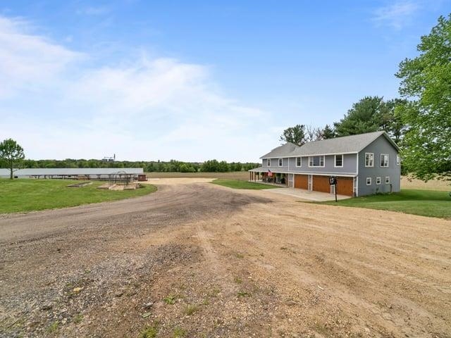 8294 North Leaf River Road Leaf River, IL 61047 - Photo 49 of 56 a view of lake with a big yard and large trees