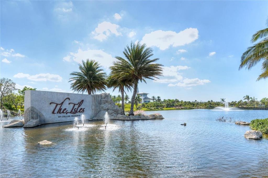 7150 Saona Court Naples, FL 34113 - Photo 20 of 31 a view of ocean with palm trees
