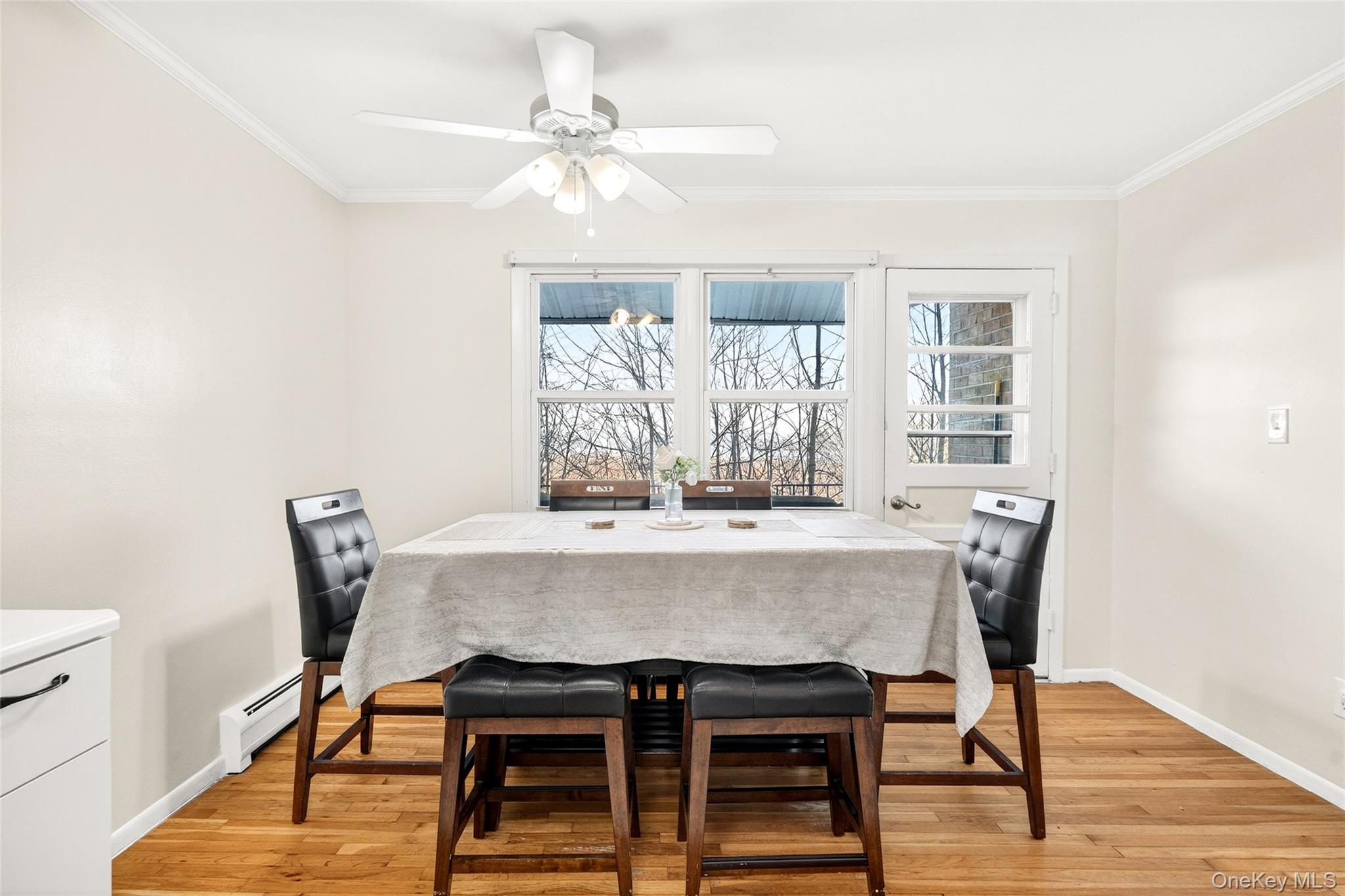 100 Dowd Street, Unit D11 Haverstraw, NY 10927 - Photo 13 of 27 a view of a dining room with furniture and wooden floor