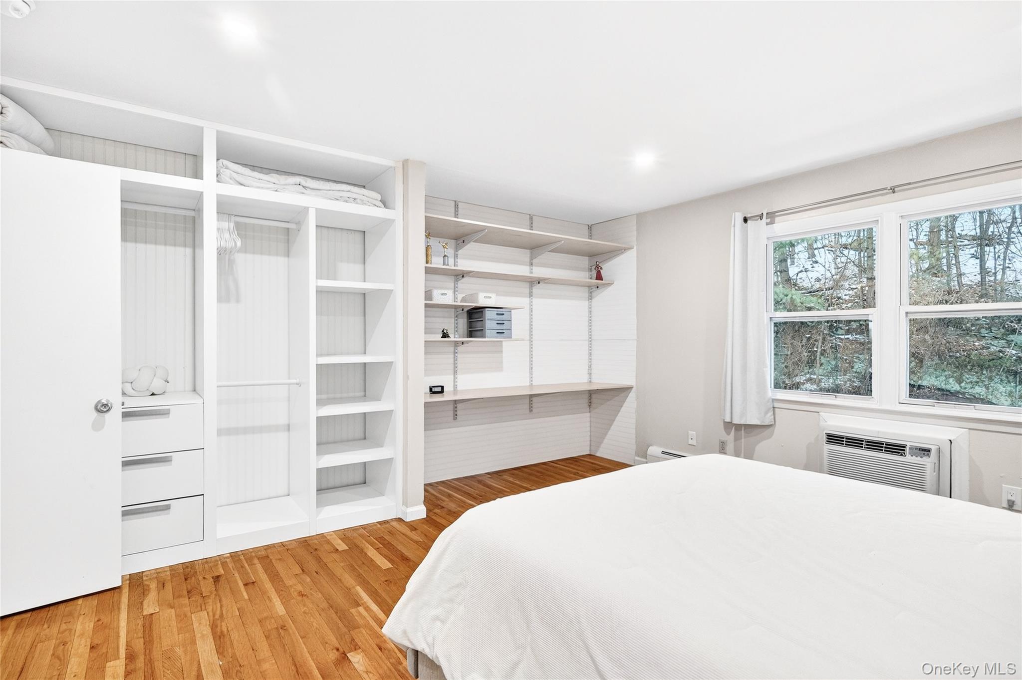 100 Dowd Street, Unit D11 Haverstraw, NY 10927 - Photo 18 of 27 a bedroom with a bed and a window