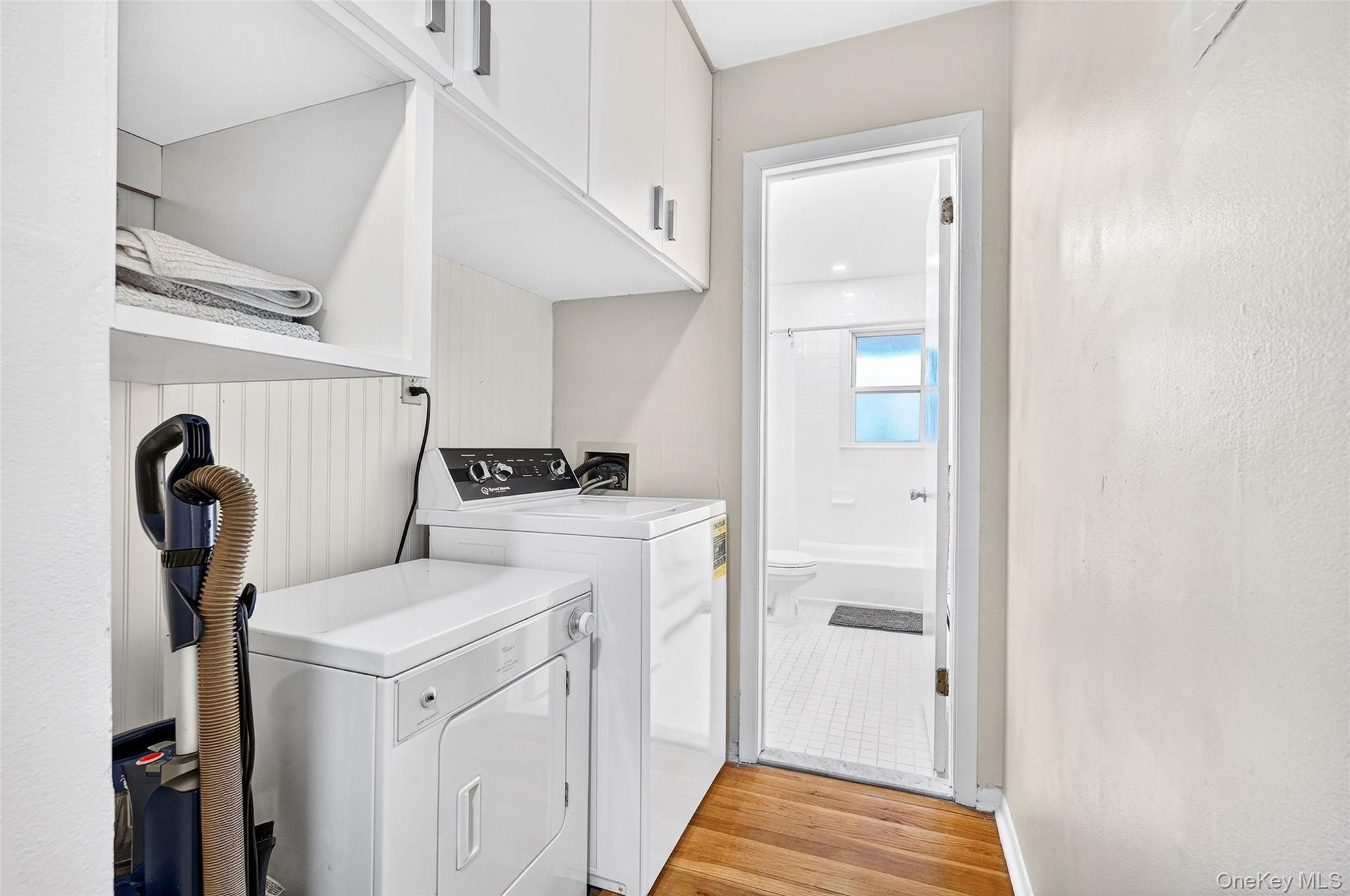 100 Dowd Street, Unit D11 Haverstraw, NY 10927 - Photo 25 of 27 a view of walk in closet with clothes and washer