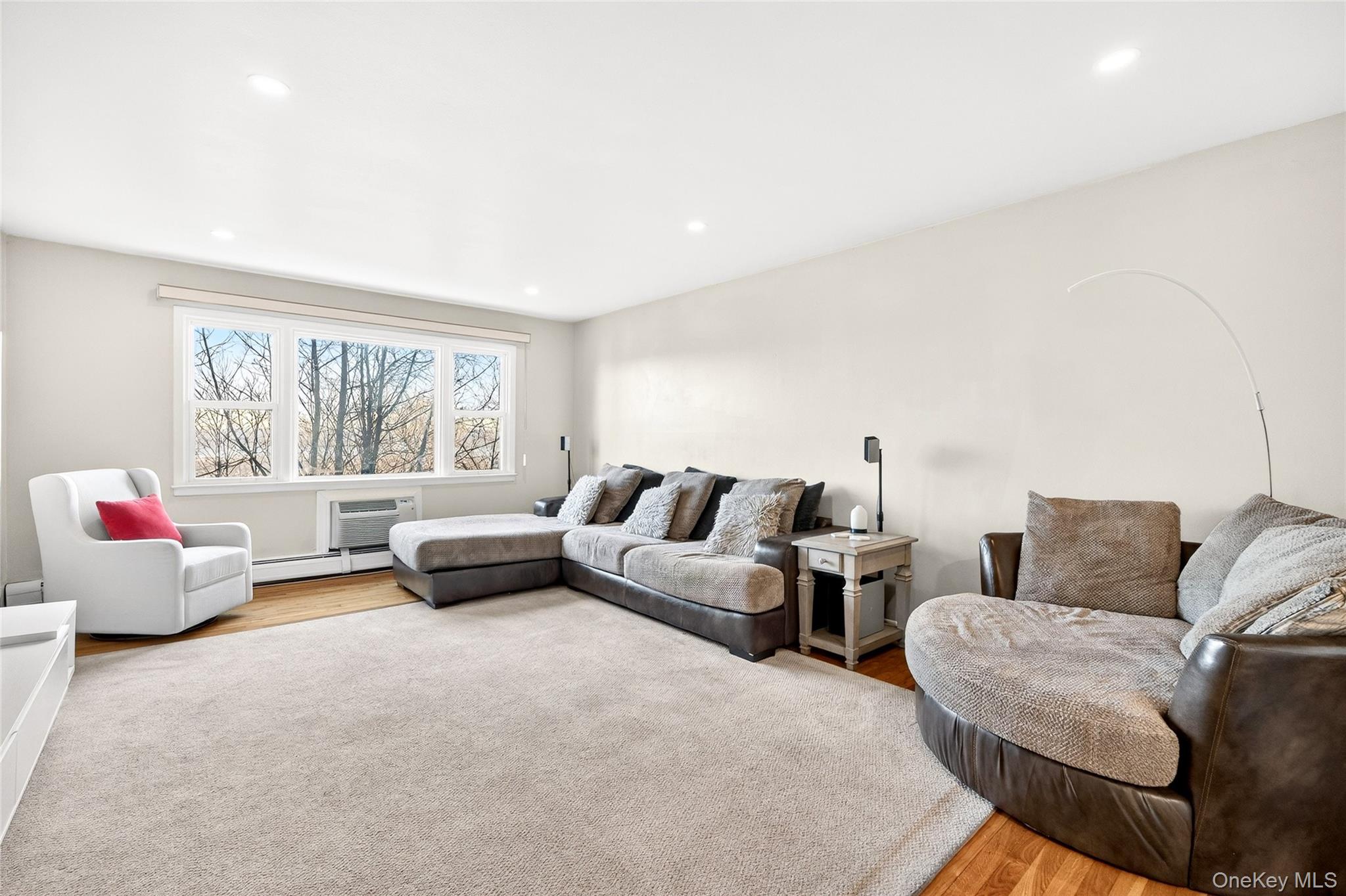 100 Dowd Street, Unit D11 Haverstraw, NY 10927 - Photo 6 of 27 a living room with furniture and a large window