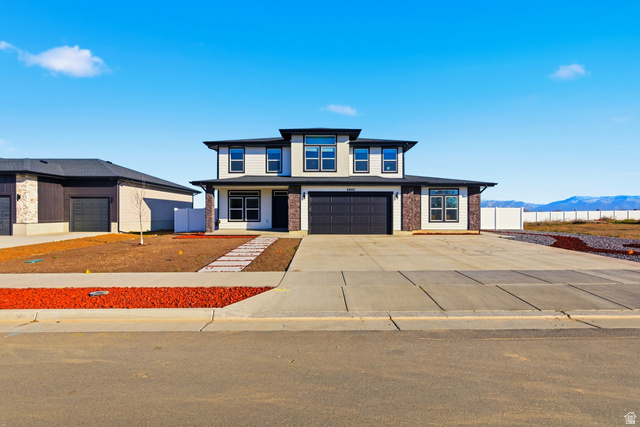 3902 West 825 North West Point, UT 84015 - Photo 3 of 49 Prairie-style house with concrete driveway and a garage