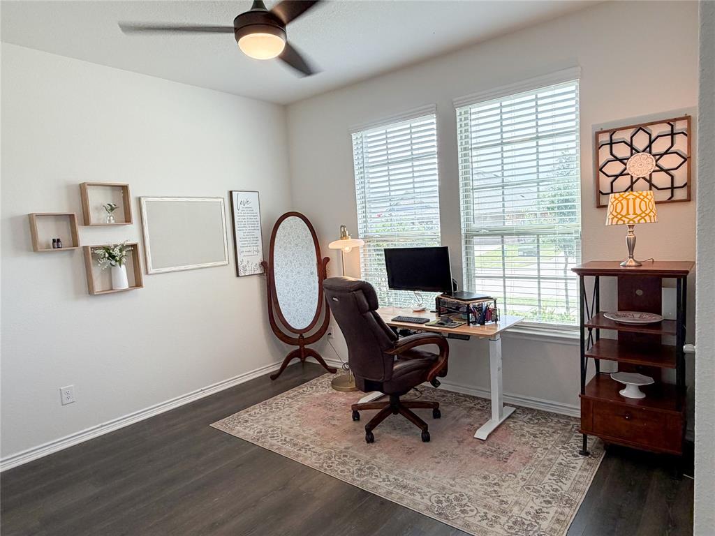 929 Philadelphia Street Fate, TX 75189 - Photo 20 of 34 a view of a workspace with furniture and a window