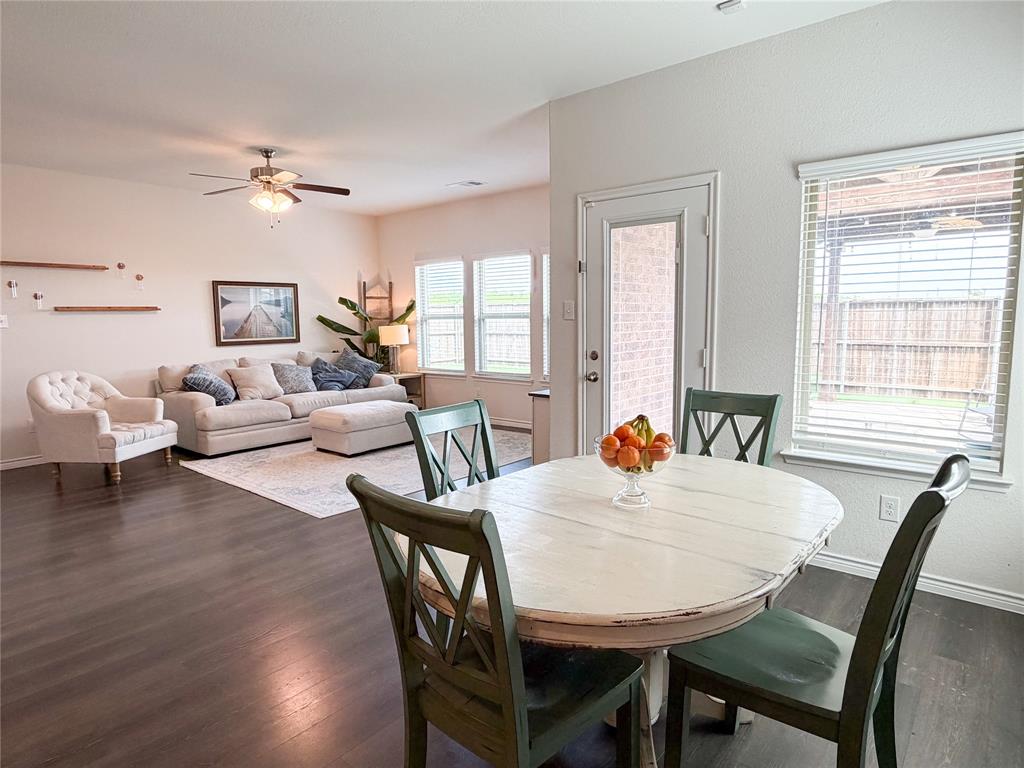 929 Philadelphia Street Fate, TX 75189 - Photo 6 of 34 a view of a dining room with furniture window and wooden floor