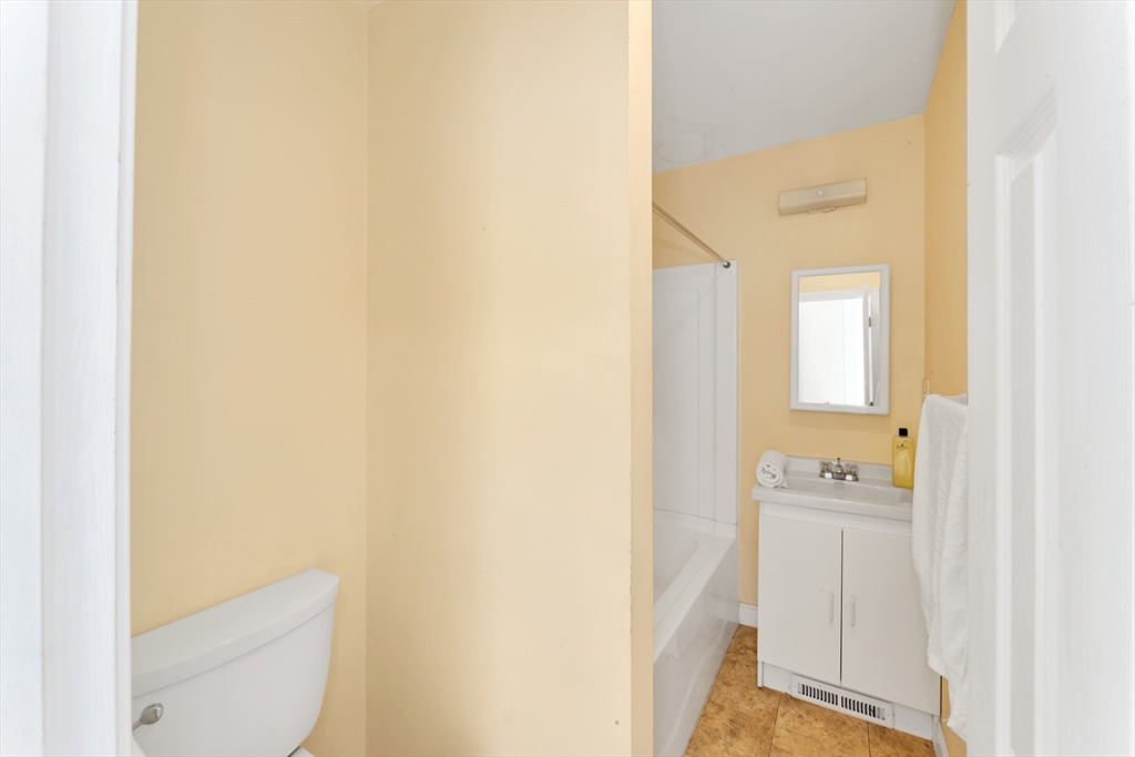 53 Brookside Avenue Boston, MA 02130 - Photo 11 of 28 a bathroom with a toilet