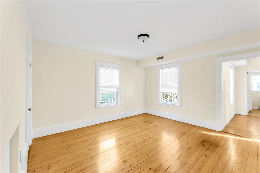 53 Brookside Avenue Boston, MA 02130 - Photo 16 of 28 a view of an empty room and window