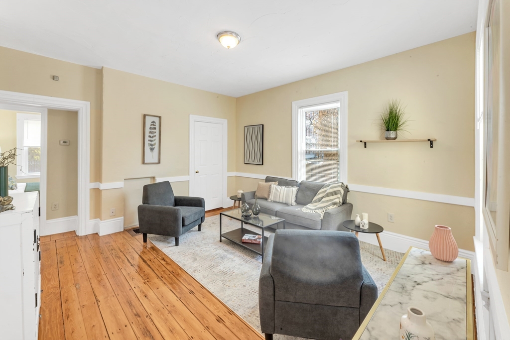 53 Brookside Avenue Boston, MA 02130 - Photo 2 of 28 a living room with furniture and wooden floor