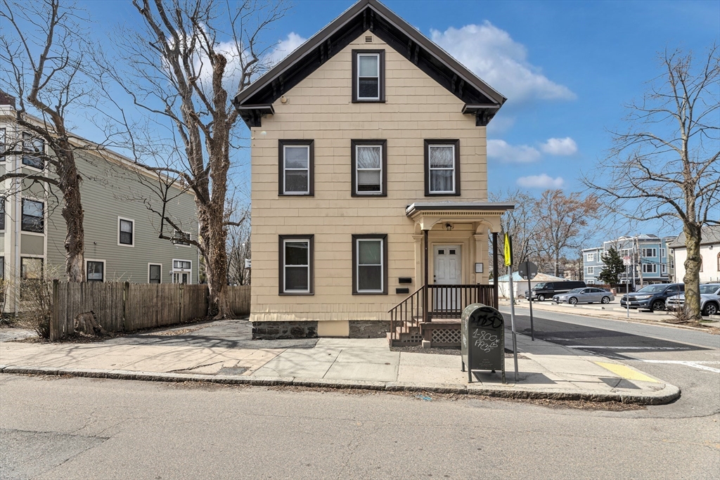 53 Brookside Avenue Boston, MA 02130 - Photo 21 of 28 a front view of a house with a yard