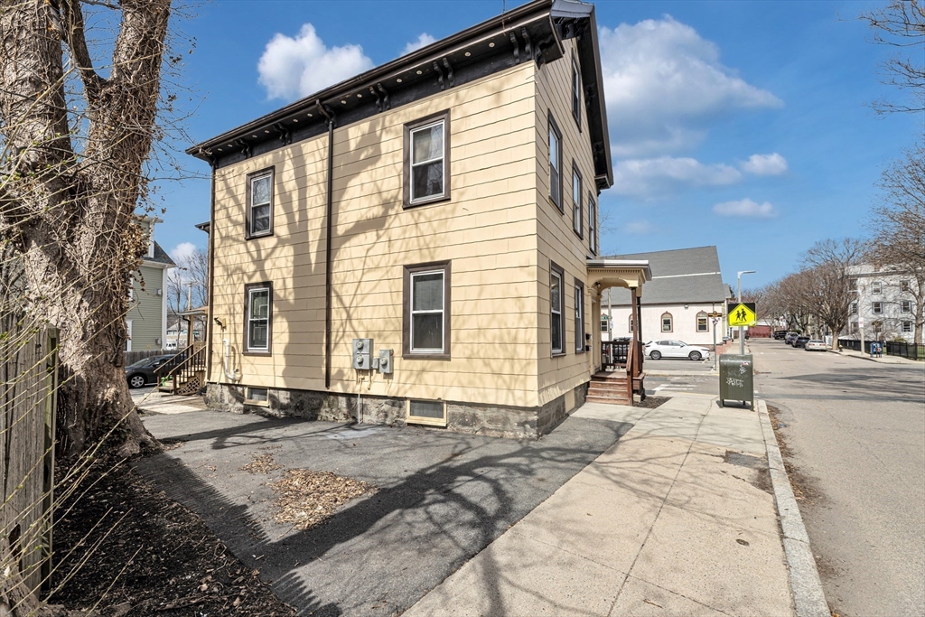53 Brookside Avenue Boston, MA 02130 - Photo 24 of 28 a view of a house with a patio