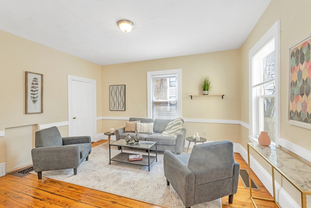 53 Brookside Avenue Boston, MA 02130 - Photo 3 of 28 a living room with furniture and a large window