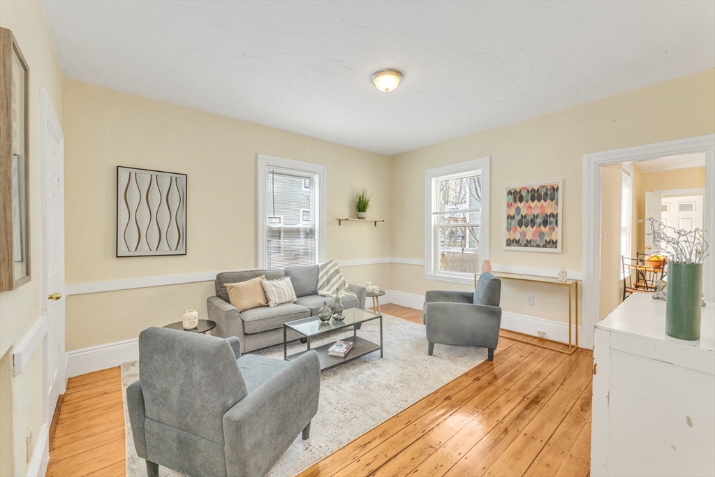 53 Brookside Avenue Boston, MA 02130 - Photo 4 of 28 a living room with furniture and a wooden floor