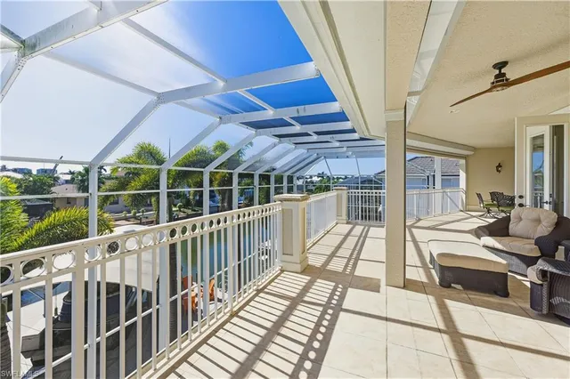 a view of a balcony with wooden floor