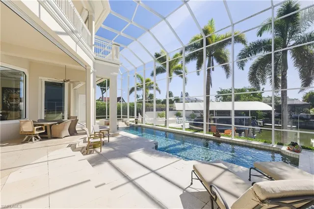 a view of a building with outdoor seating