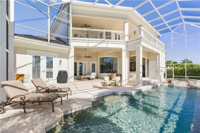 a view of a building with a sitting area