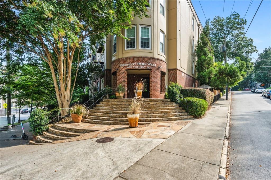 1029 Piedmont Avenue Northeast, Unit 303 Atlanta, GA 30309 - Photo 2 of 44 a view of outdoor space yard and front view of a house