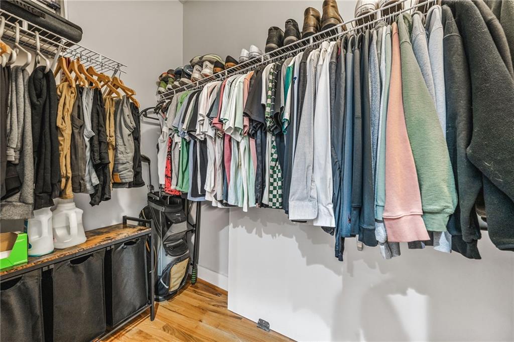 1029 Piedmont Avenue Northeast, Unit 303 Atlanta, GA 30309 - Photo 24 of 44 a view of walk in closet with clothes