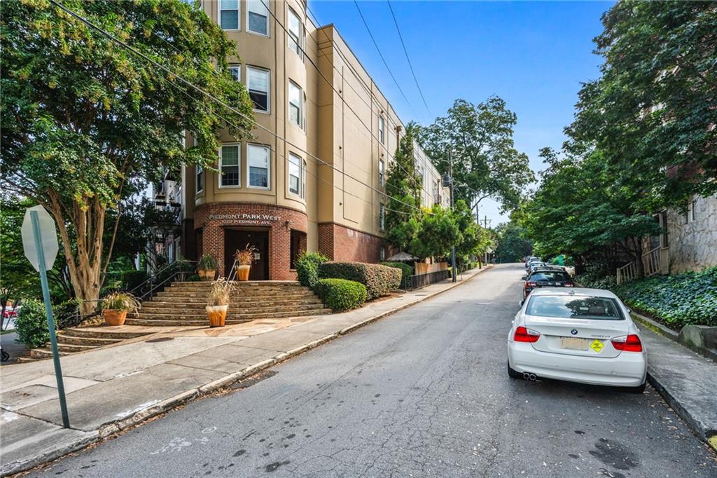 1029 Piedmont Avenue Northeast, Unit 303 Atlanta, GA 30309 - Photo 32 of 44 a car parked on the side of a street