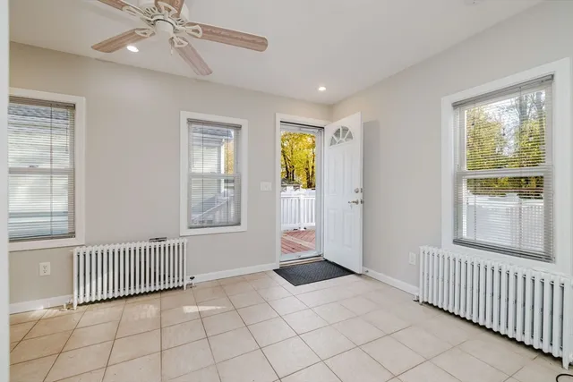 a view of an empty room and window