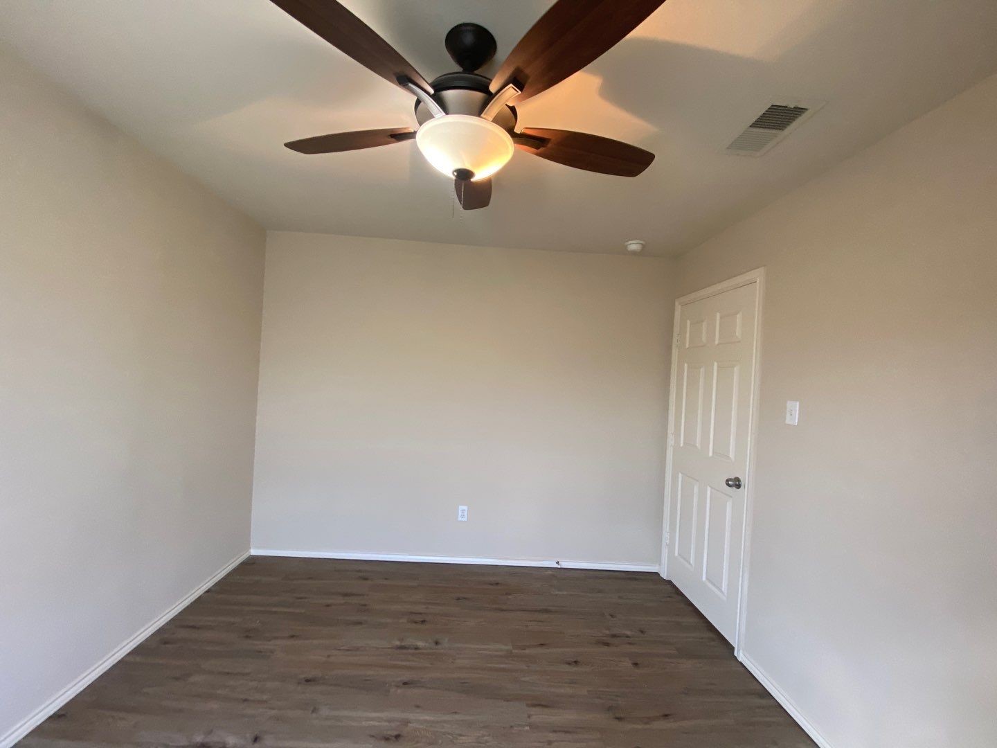 2101 Crestwind Court Pearland, TX 77584 - Photo 16 of 41 wooden floor in an empty room