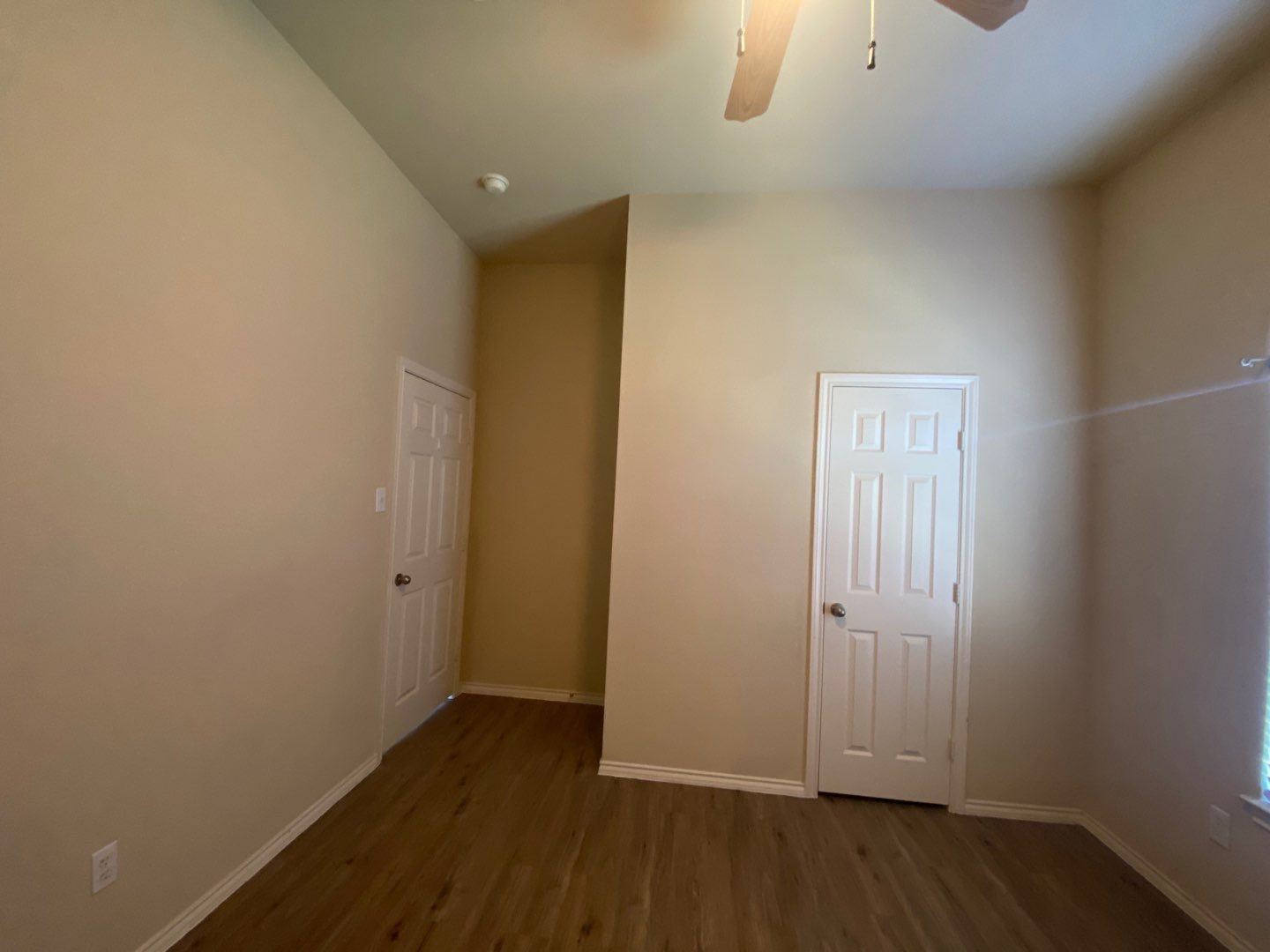 2101 Crestwind Court Pearland, TX 77584 - Photo 23 of 41 an empty room with wooden floor