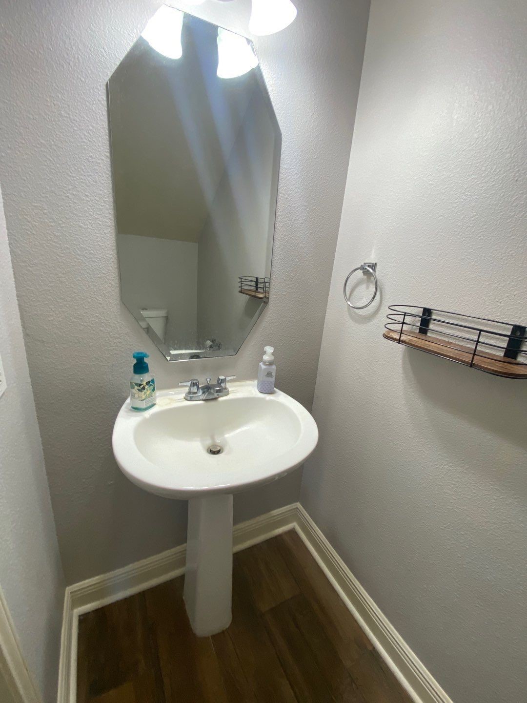 2101 Crestwind Court Pearland, TX 77584 - Photo 36 of 41 a bathroom with a sink and mirror