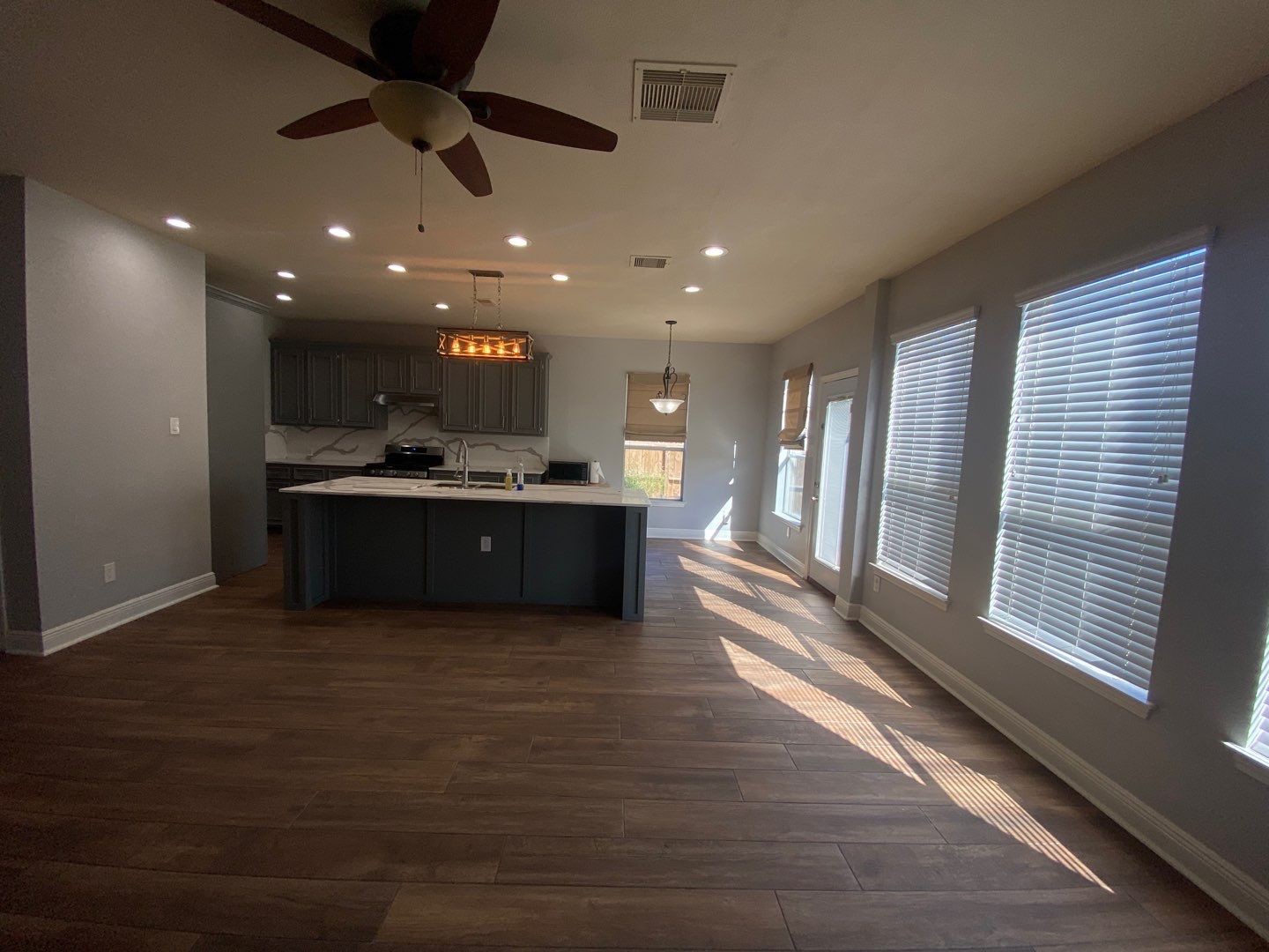 2101 Crestwind Court Pearland, TX 77584 - Photo 8 of 41 a view of kitchen with sink and wooden floor