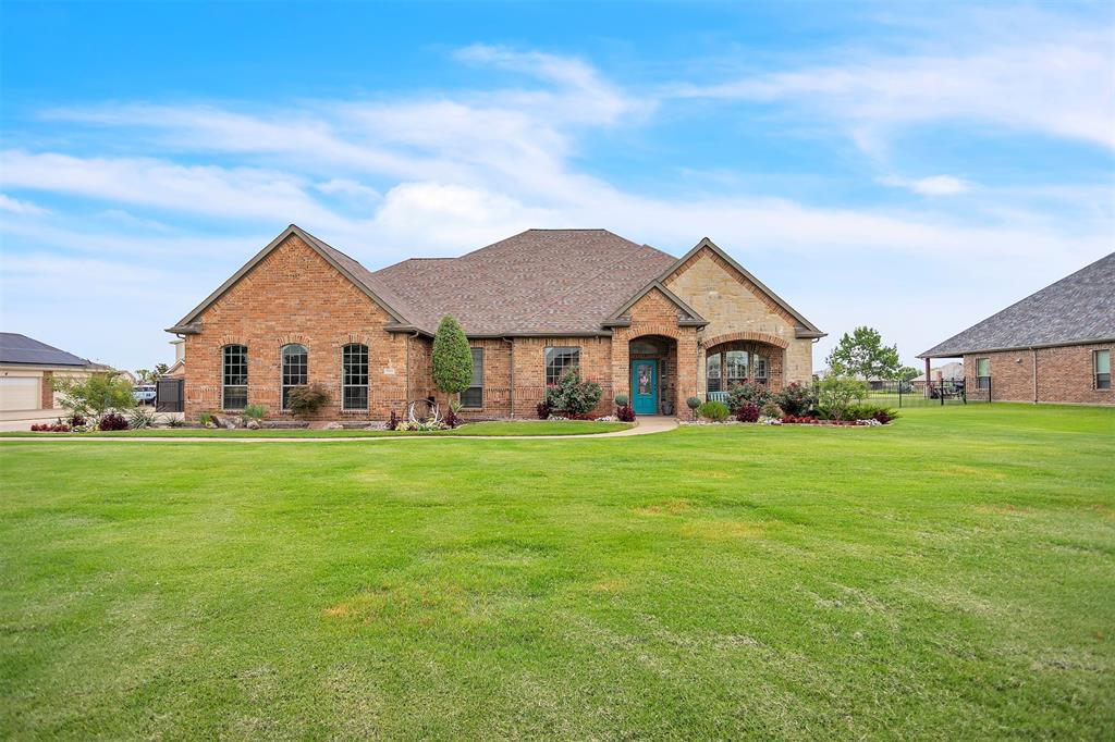 12286 Emerald Ranch Lane North Forney, TX 75126 - Photo 2 of 40 a view of a house with a yard and fence