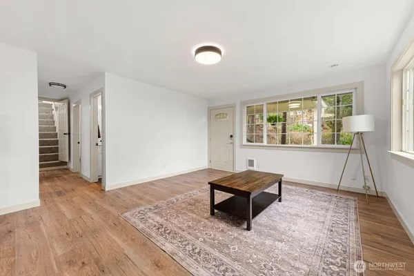 a room with a bed and a window