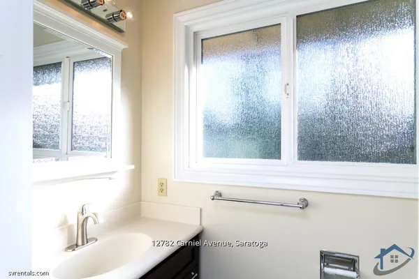 a bathroom with a sink and a bathtub