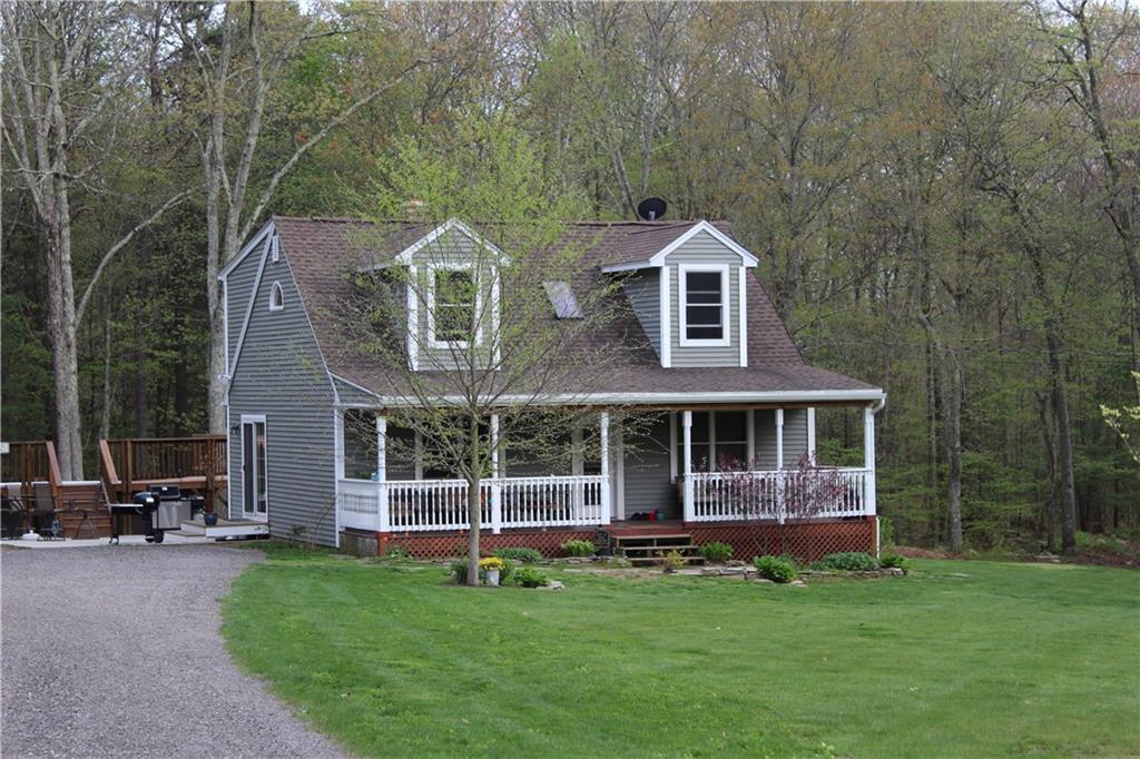 167 Valley View Road Sterling, CT 06377 - Photo 1 of 1 a front view of a house with a garden