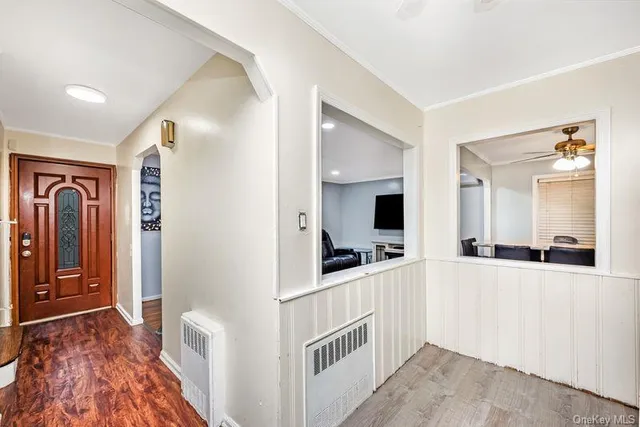 a view of a bathroom from the hallway