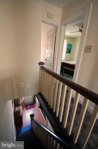 2261 Sidney Avenue Baltimore, MD 21230 - Photo 7 of 11 a view of a balcony with wooden floor