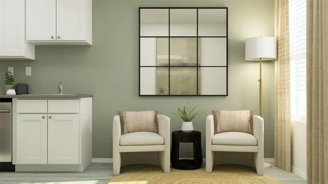 a living room with furniture a couch and a lamp next to a window