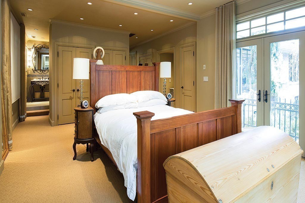 181 Laurel Road Brookline, MA 02467 - Photo 8 of 19 a bedroom with a bed and a large window
