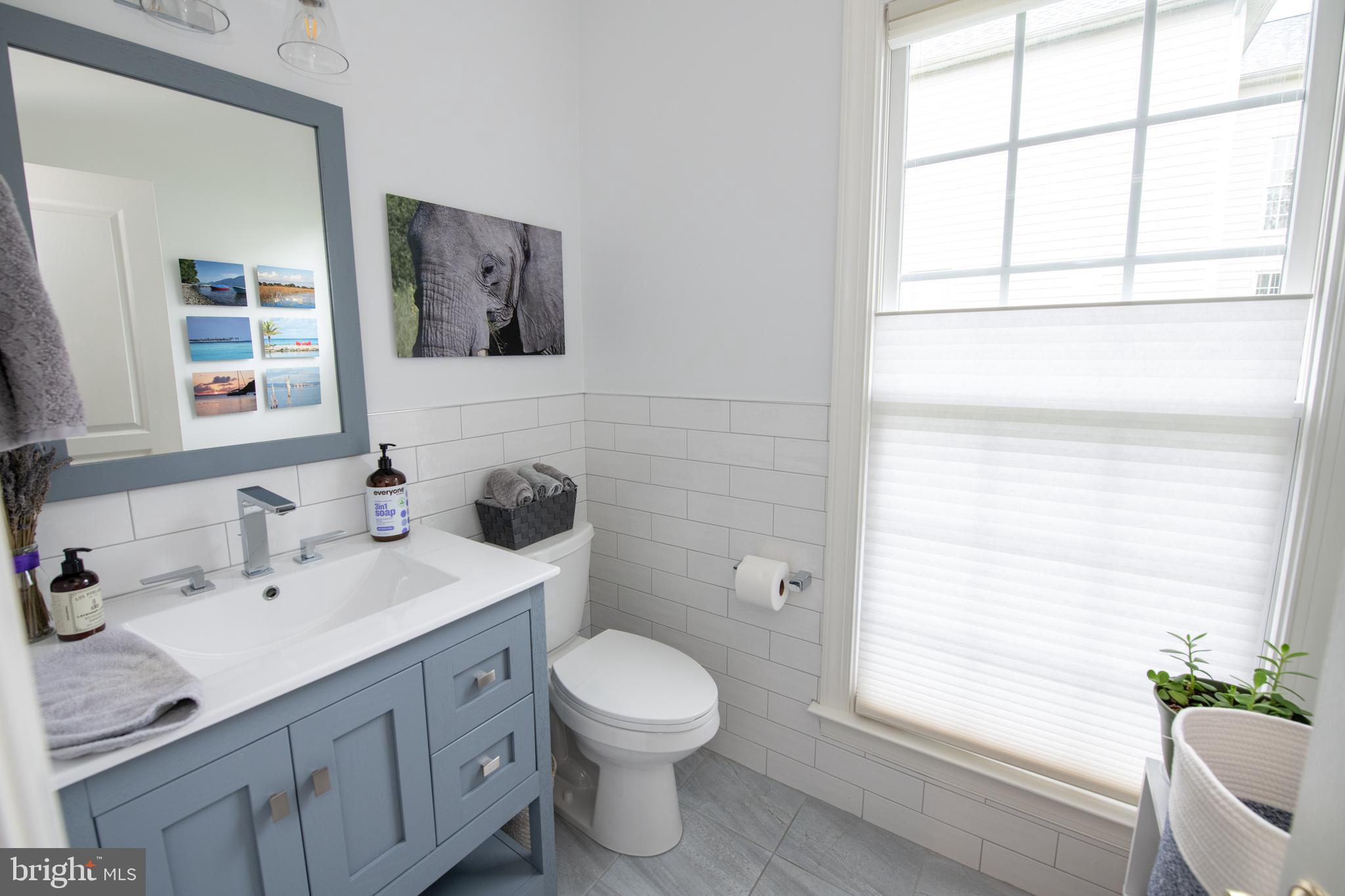 32 Eagleton Farm Road Newtown, PA 18940 - Photo 15 of 39 a bathroom with a toilet sink and mirror