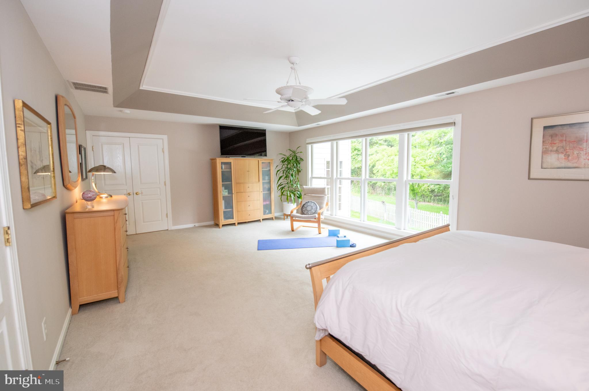 32 Eagleton Farm Road Newtown, PA 18940 - Photo 18 of 39 a bed sitting in a spacious bedroom next to a window
