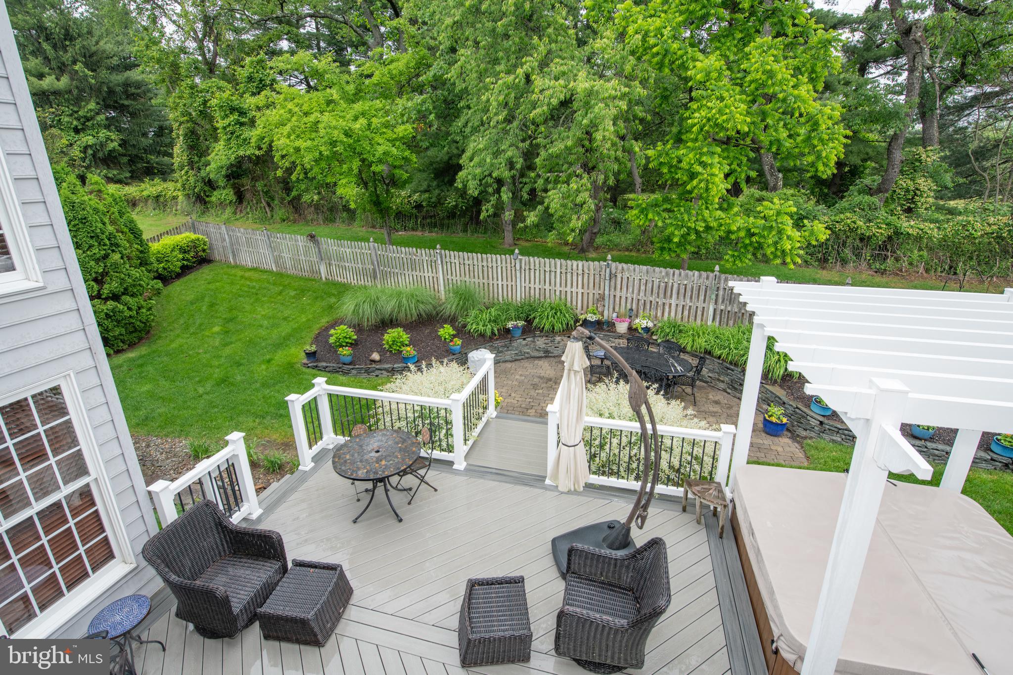 32 Eagleton Farm Road Newtown, PA 18940 - Photo 19 of 39 a view of a chair and tables in the backyard