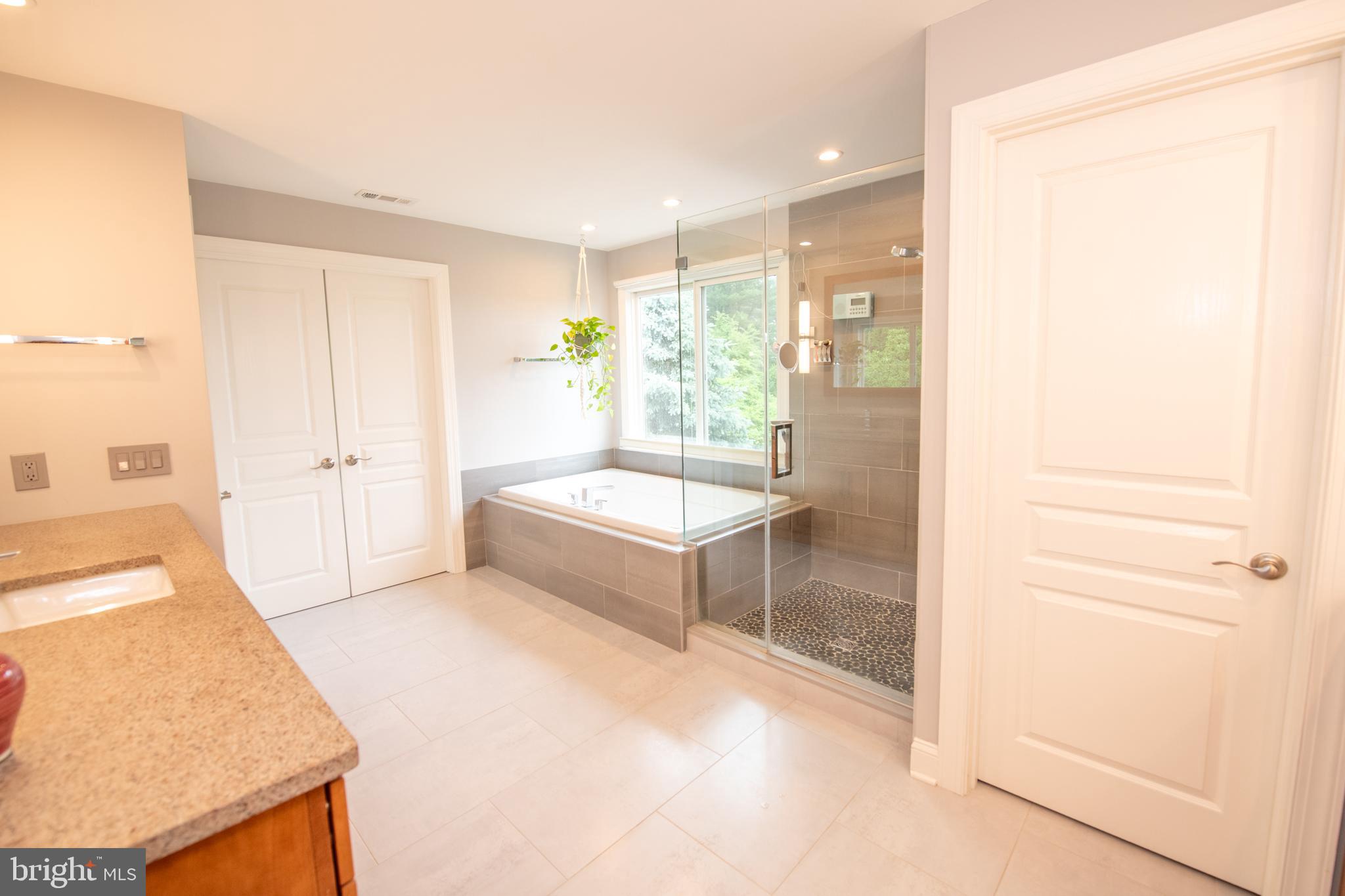 32 Eagleton Farm Road Newtown, PA 18940 - Photo 21 of 39 a bathroom with a tub and shower