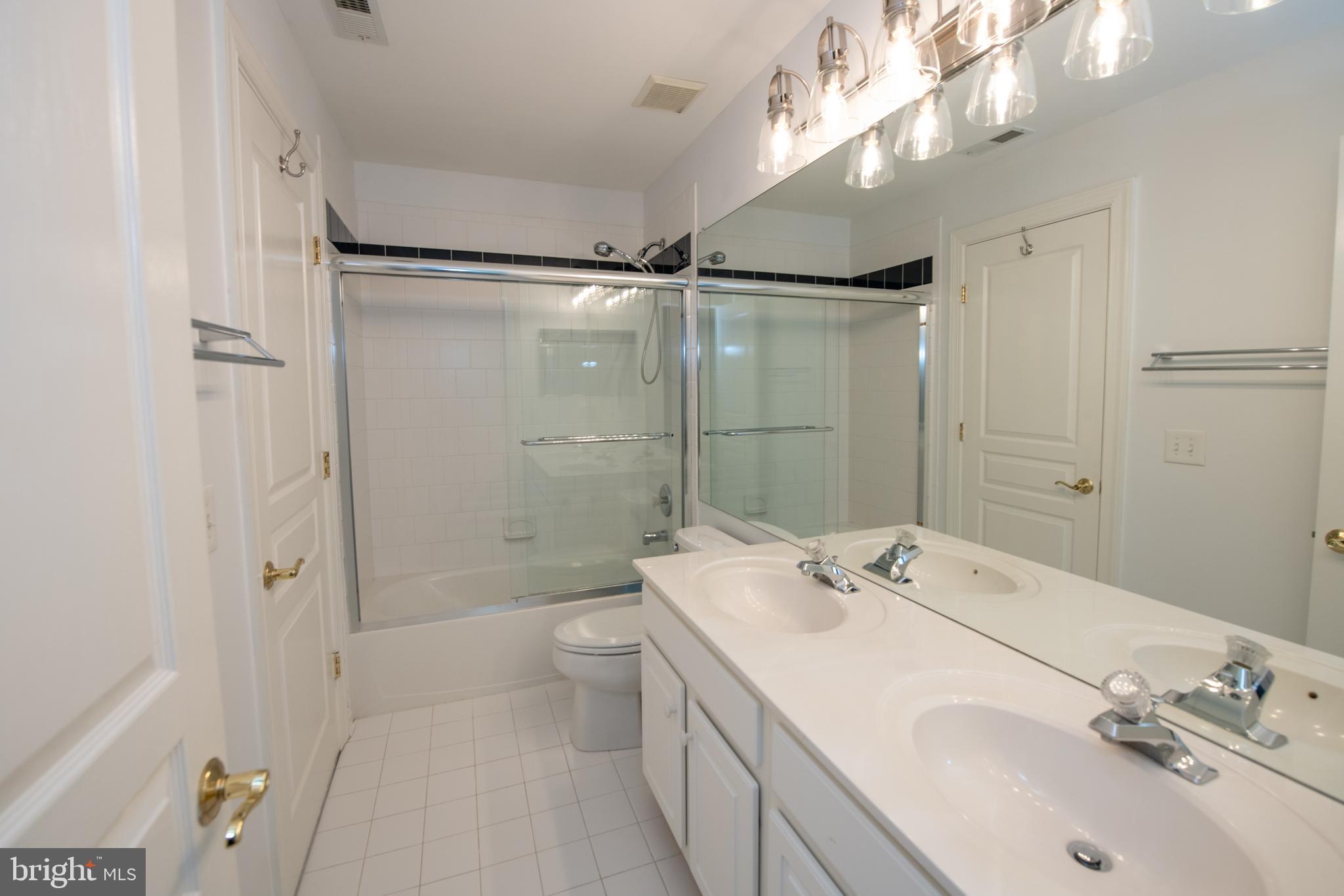 32 Eagleton Farm Road Newtown, PA 18940 - Photo 23 of 39 a bathroom with a sink a toilet and shower
