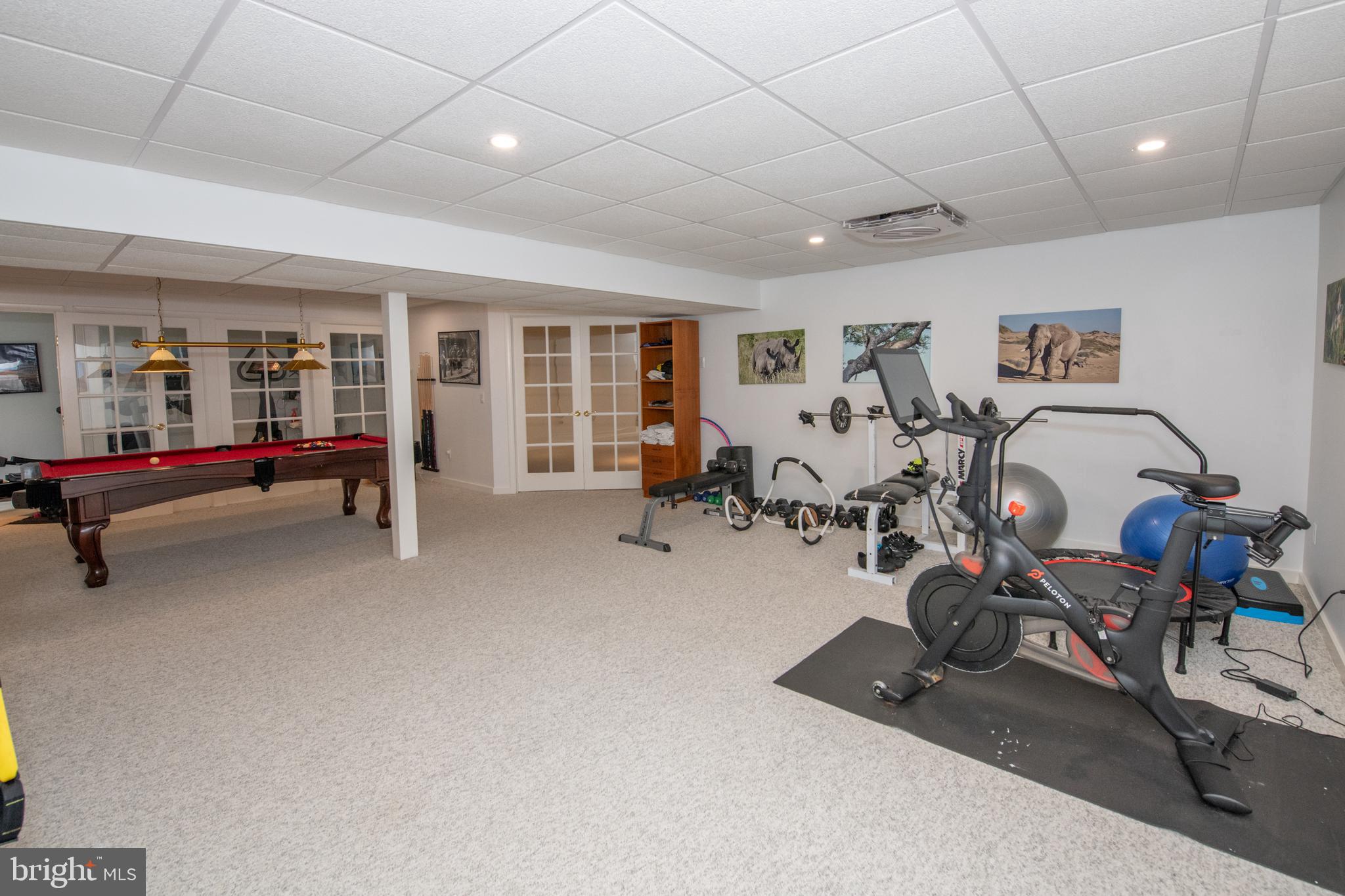 32 Eagleton Farm Road Newtown, PA 18940 - Photo 27 of 39 a room with gym equipment and a large window