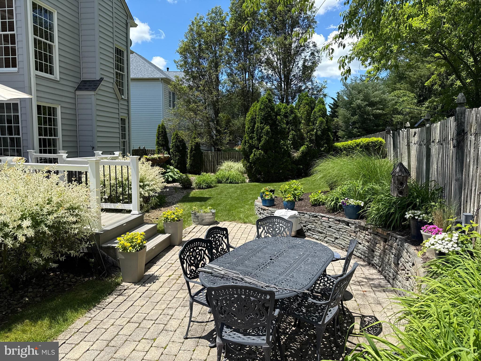 32 Eagleton Farm Road Newtown, PA 18940 - Photo 31 of 39 a view of a backyard with sitting area and furniture
