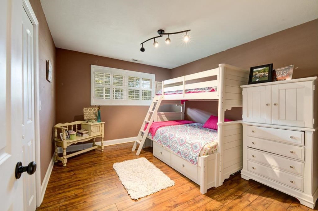 1300 Main Street Decatur, TN 37322 - Photo 12 of 31 a bedroom with a bed and a dresser