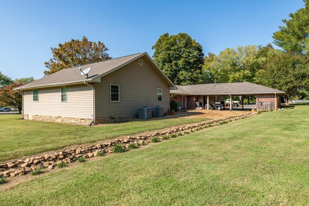 1300 Main Street Decatur, TN 37322 - Photo 29 of 31 a front view of house with yard and green space