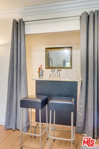 a living room with a couch and a flat screen tv