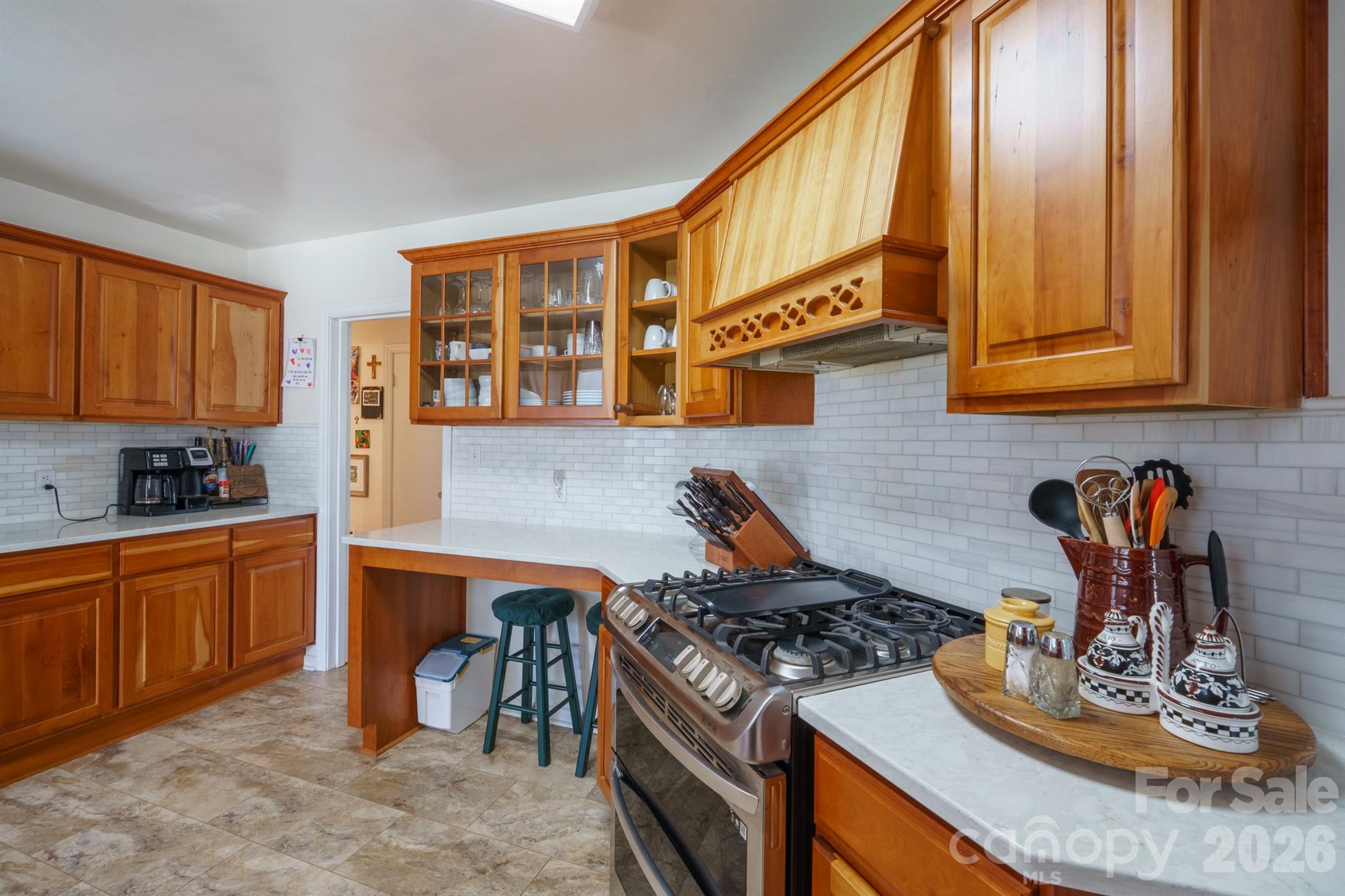 712 2nd Avenue Northwest Conover, NC 28613 - Photo 12 of 33 a kitchen with stainless steel appliances granite countertop a stove and a sink